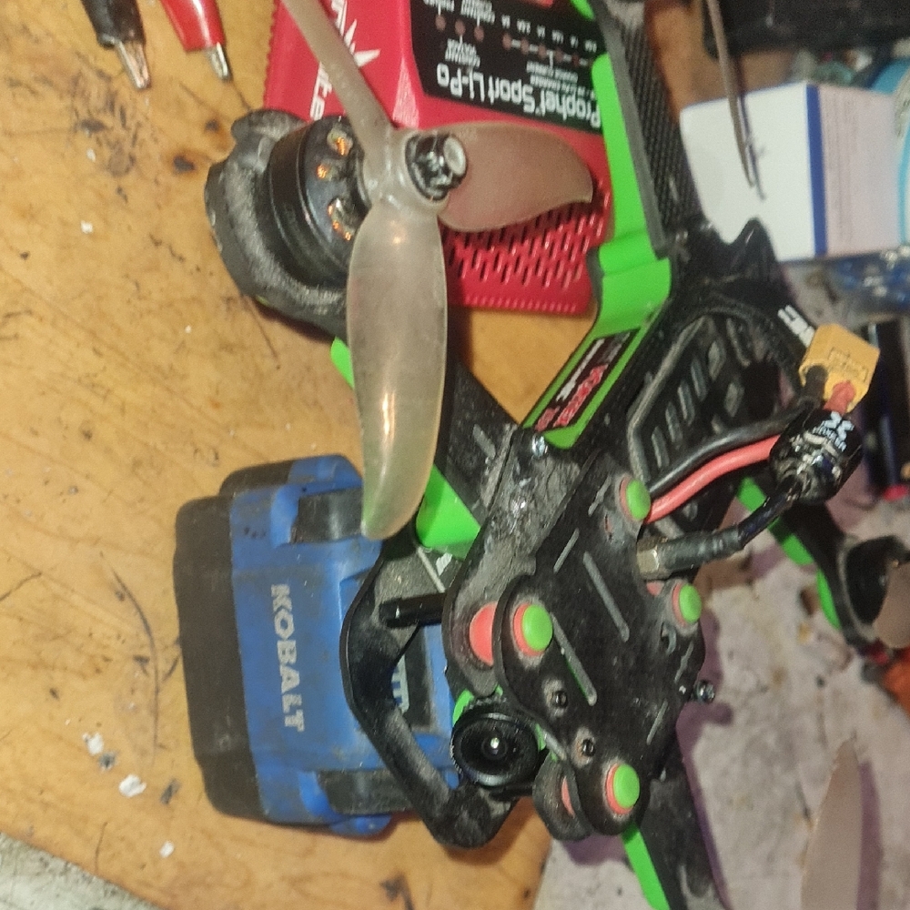 Green and Black Drone with Camera
